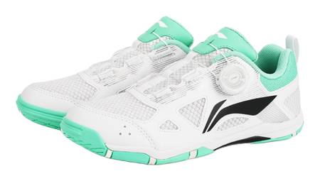 Pair of table tennis shoes in white with green uppers and black side logo