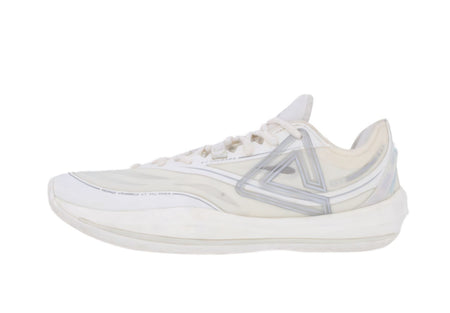 Lightweight basketball shoe in cream white with laced front and cushioned sole.