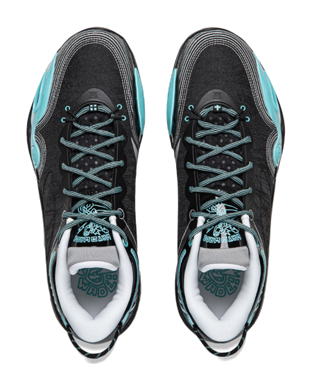 Black basketball shoes with teal laces, white tongue lining, and light outsole tread