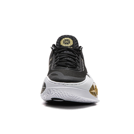 Men's black and white basketball shoe with gold heel detail and lace-up front