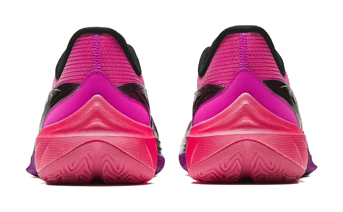 Low-top basketball shoes, heel and outsole view; fluorescent rose with black collar.