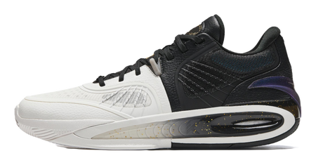 White and black basketball shoe with low-top lace-up design and translucent outsole