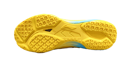 Yellow rubber outsole for table tennis shoe with textured traction pattern