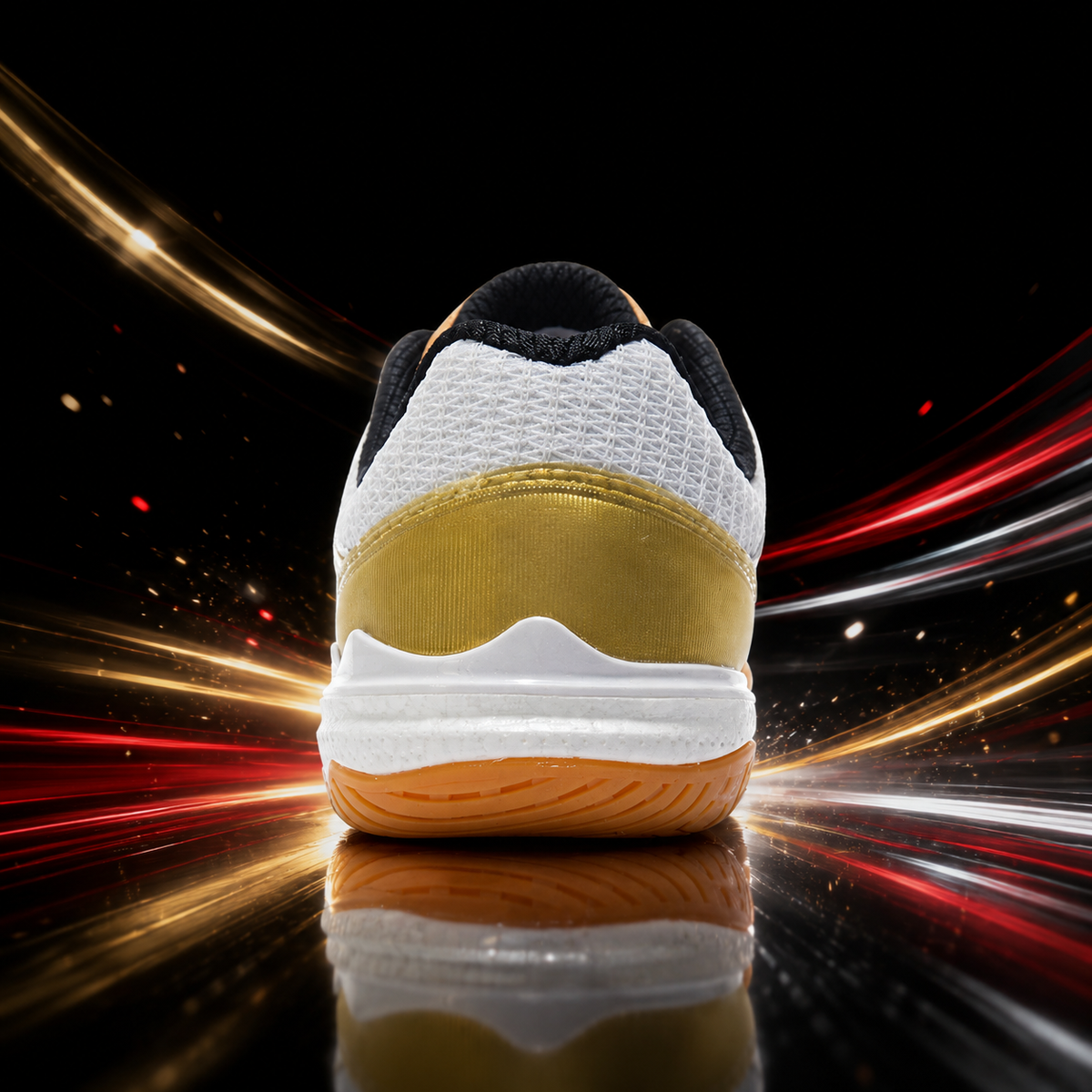 White table tennis shoe with knit upper, black collar and gold heel stripe, white outsole