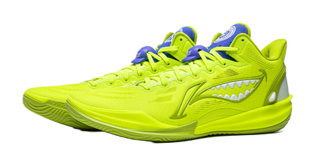 Pair of green low basketball shoes with monster-tooth graphics and blue tongue accents