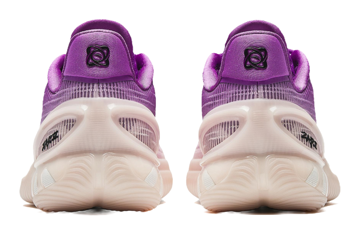 Purple and white basketball shoes, back view, cushioned heel and molded collar
