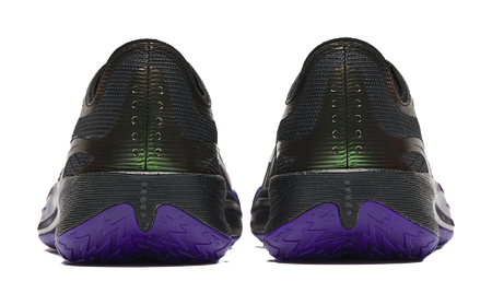 Pair of black basketball shoes with purple heel tread and neon green branding