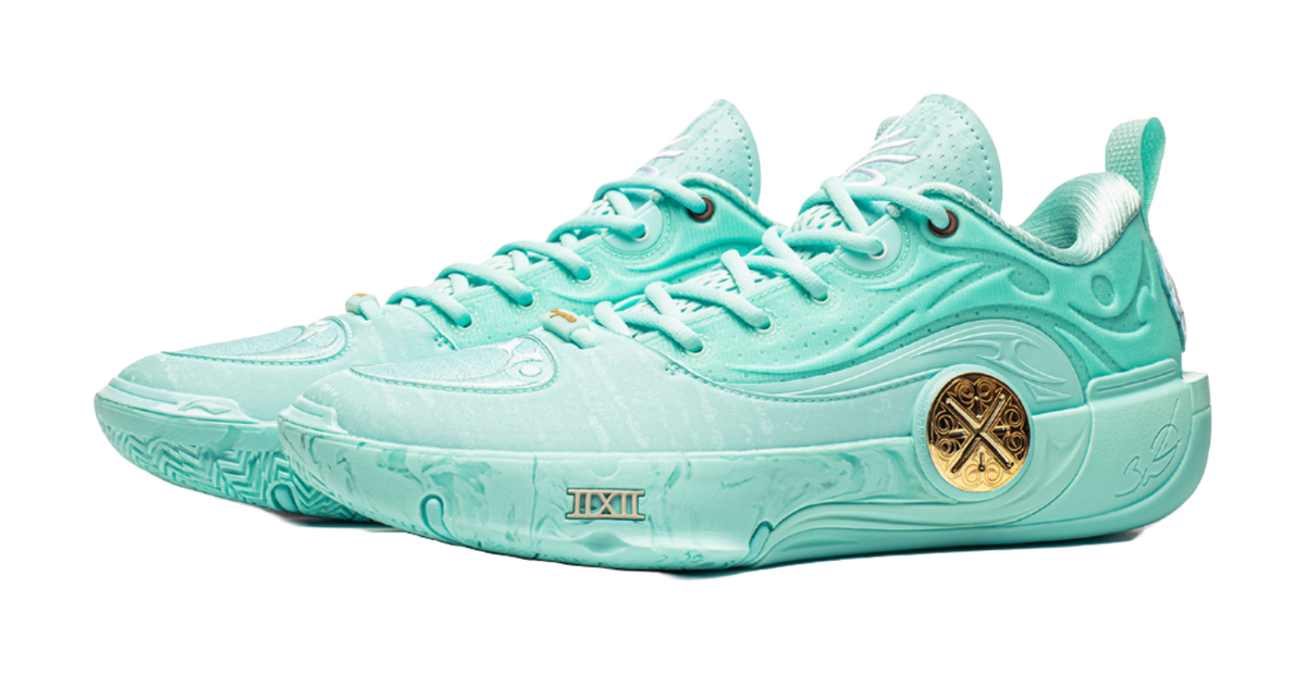 Pair of light teal low-top basketball shoes, angled top view with lace-up details