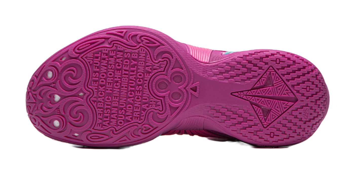 Purple basketball shoe outsole with textured tread and teal-star traction design.