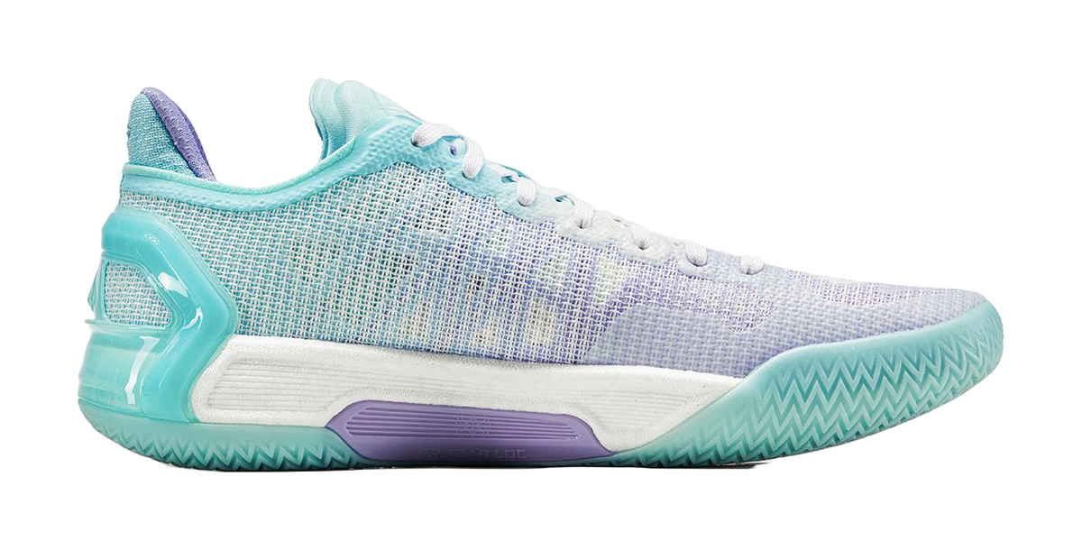 Light blue mesh low-top basketball shoe with teal sidewall and zigzag sole pattern