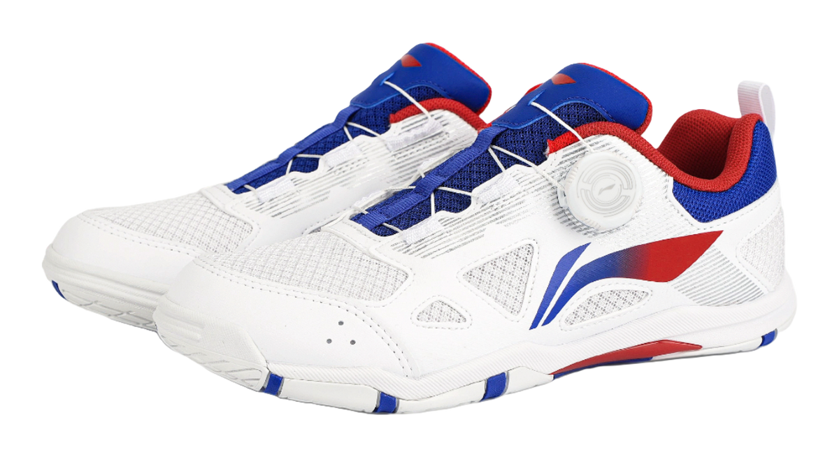 Pair of table tennis shoes: white uppers with blue panels and red heel accents