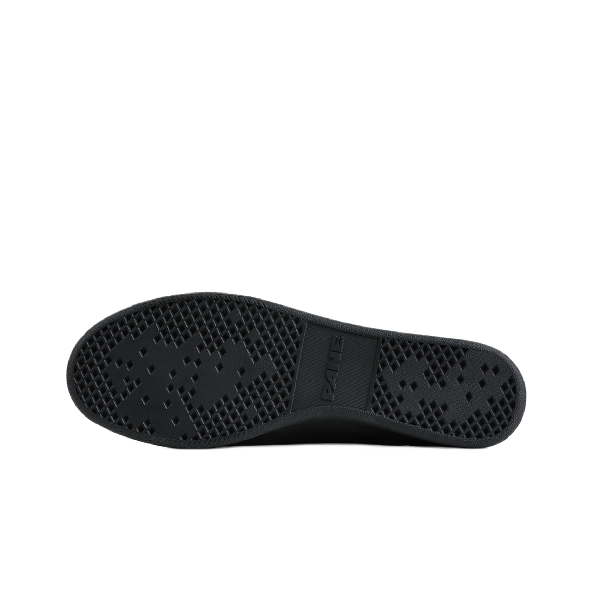 Black rubber outsole with textured diamond tread pattern on low-top training shoe.