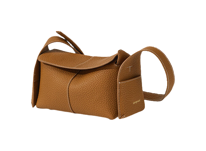 Mini cow leather shoulder bag in tan brown with top flap and curved front seams