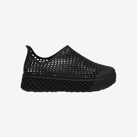 Black 3D printed kids slip-on shoes with perforated knit upper