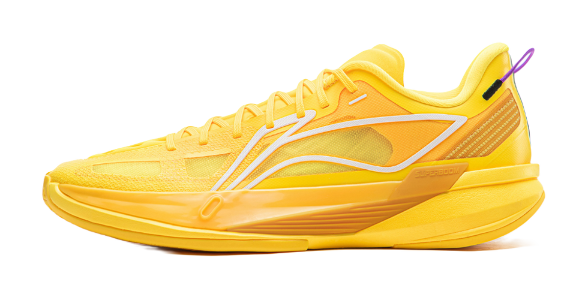 Yellow basketball shoe with white side accents and lace-up closure