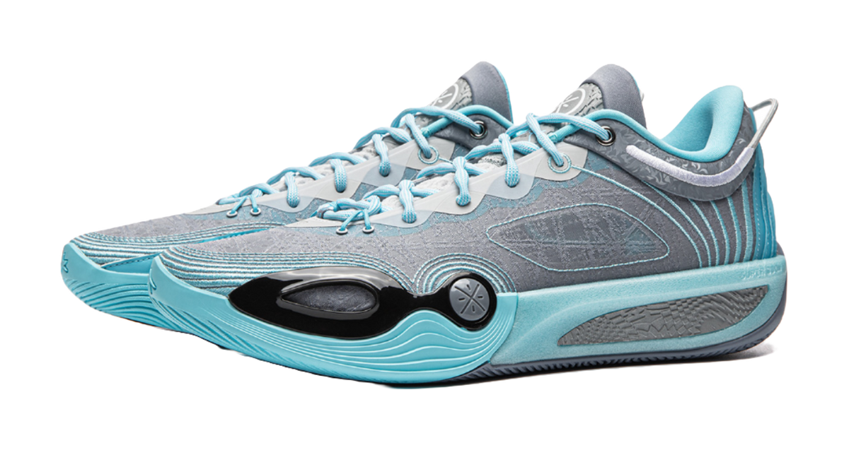 Men's low-top basketball shoe, angled front view, light blue upper and aqua outsole