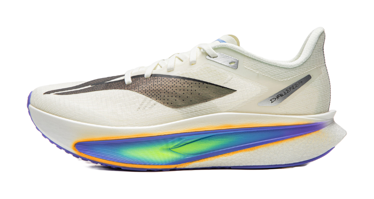 Champagne white running shoe with black logo accents and cushioned sole