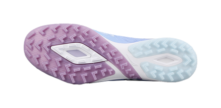 Turf soccer shoe outsole with blue and purple rubber studs traction pattern