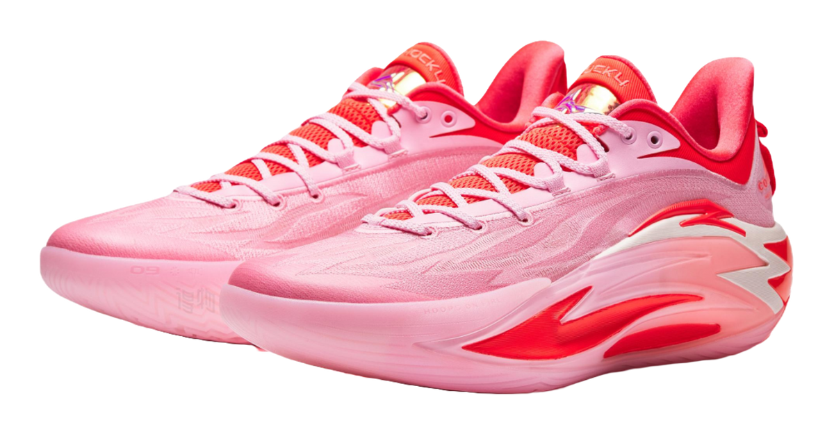 Pink basketball shoes pair, lace-up design with red side stripes and cushioned sole