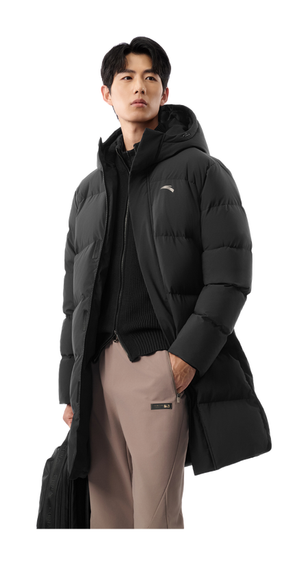 Men's black long puffer down jacket with hood and full-zip, worn view