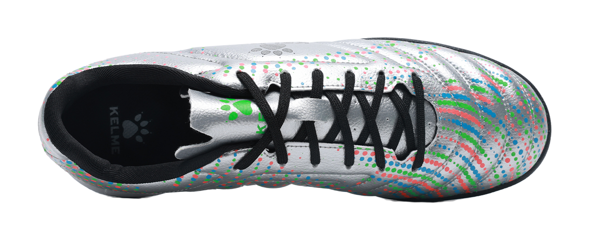 Silver unisex TF turf soccer shoe, black laces on speckled dot upper
