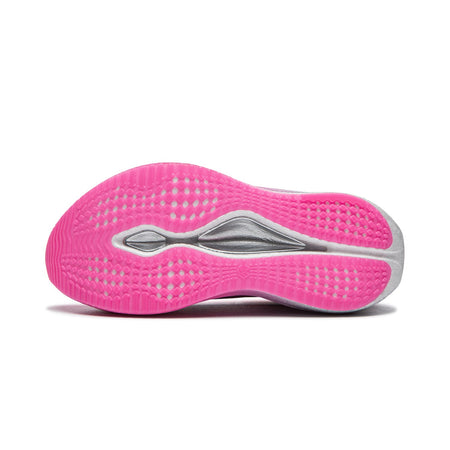 Women's pink running shoe outsole, textured tread with gray traction pods