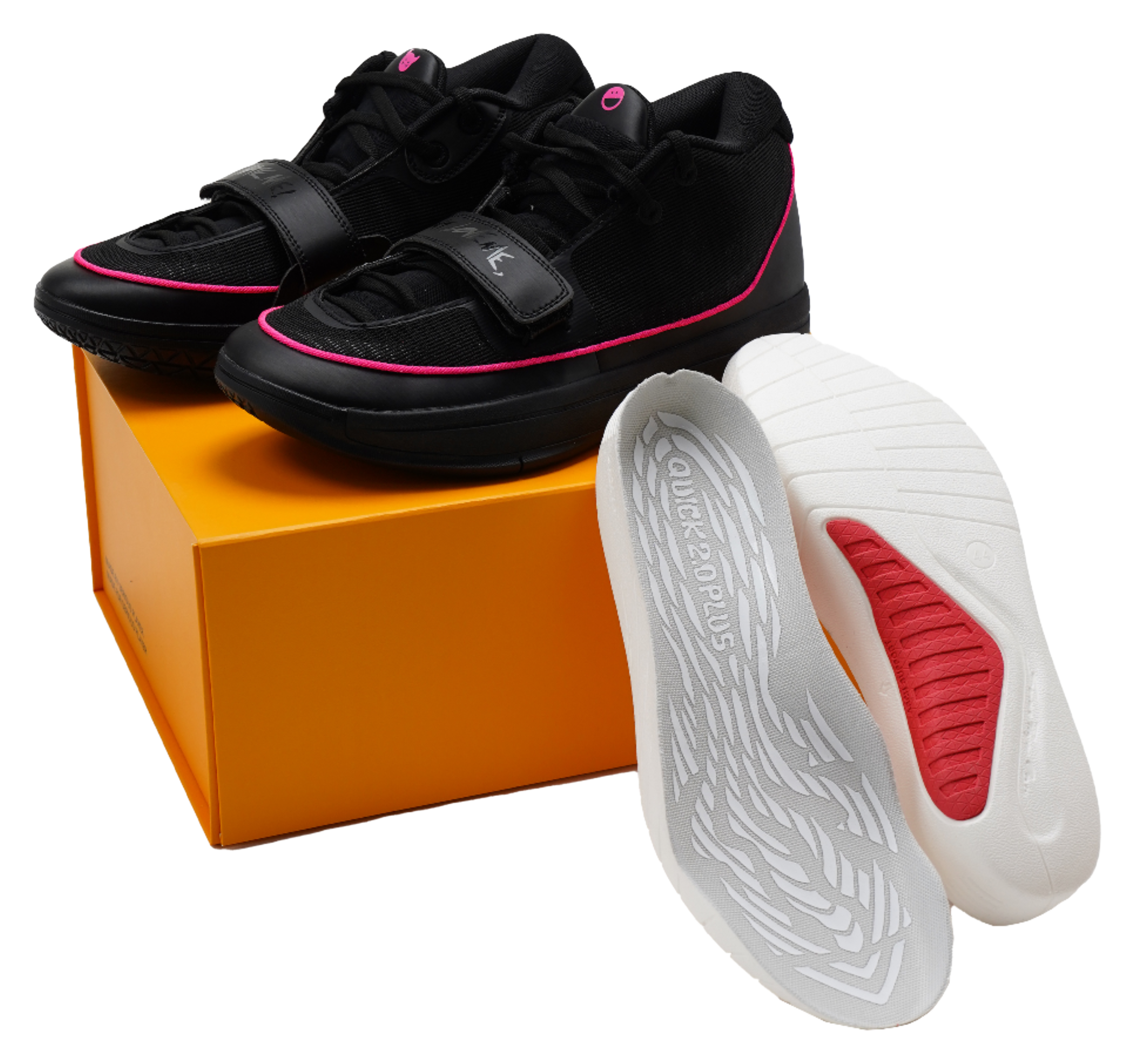 Black lace-up basketball shoes with pink trim and white-and-red outsole view