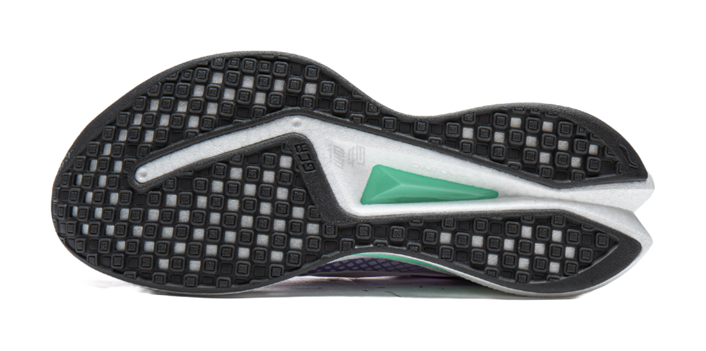 Black rubber outsole for lavender purple and white running shoe with green insert
