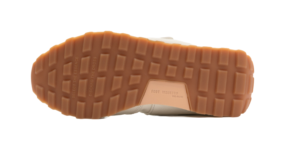 Mary Jane shoe outsole in brown rubber with tread and 'FOOT INDUSTRY' logo
