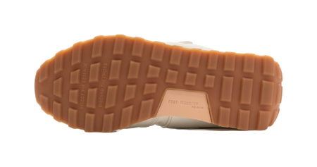 Mary Jane shoe outsole in brown rubber with tread and 'FOOT INDUSTRY' logo