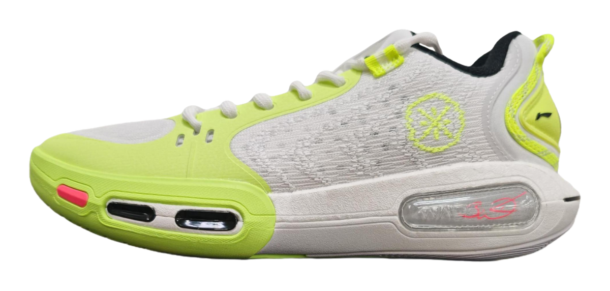 Neon green and white basketball shoe with lace-up front and air-window midsole