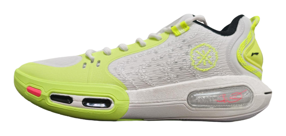 Neon green and white basketball shoe with lace-up front and air-window midsole