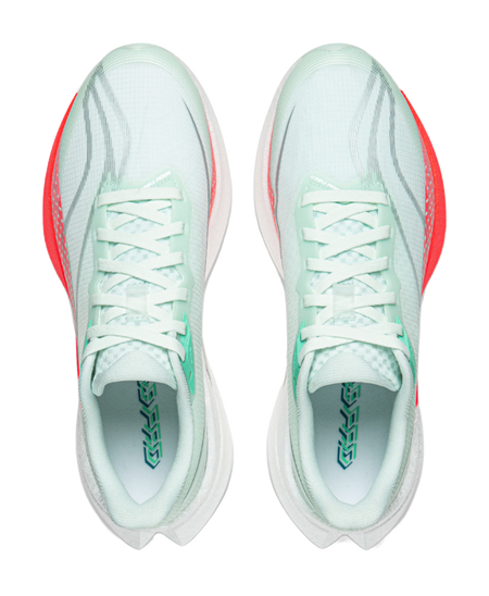 Pair of mint sneakers with white laces and green logo on tongue