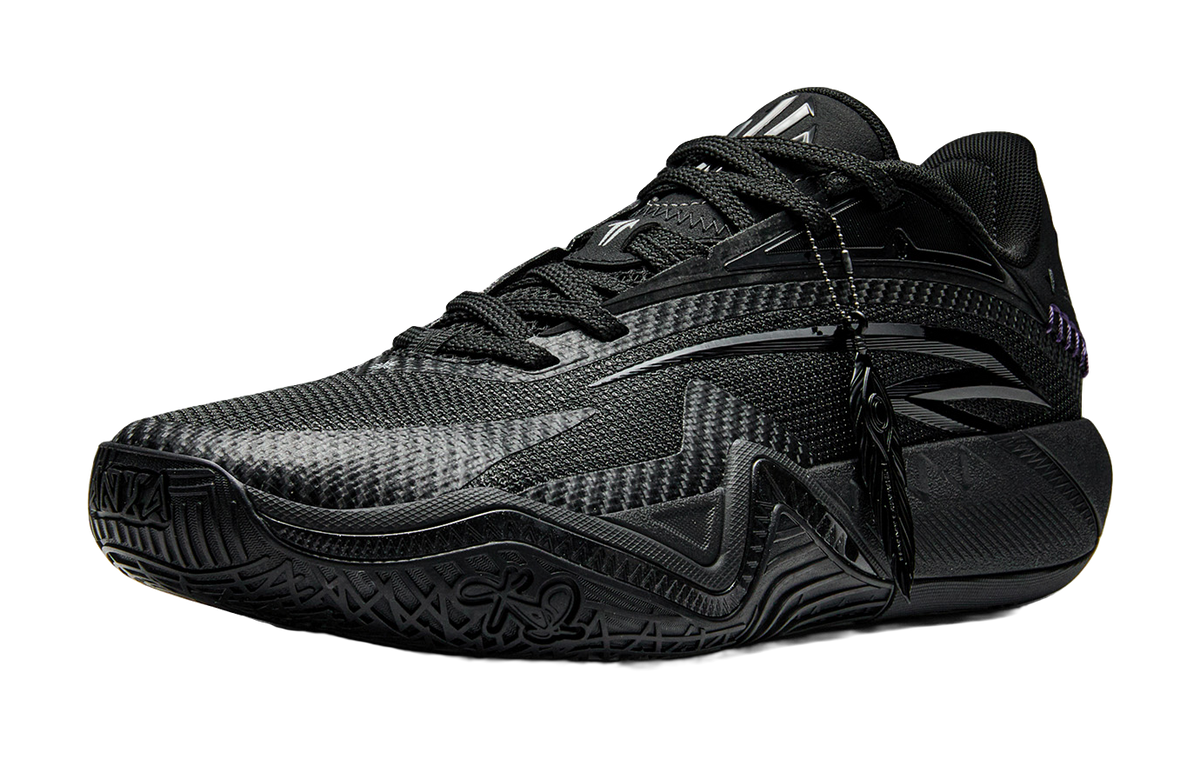 Black basketball shoe with textured mesh upper, lace-up closure, purple side accent