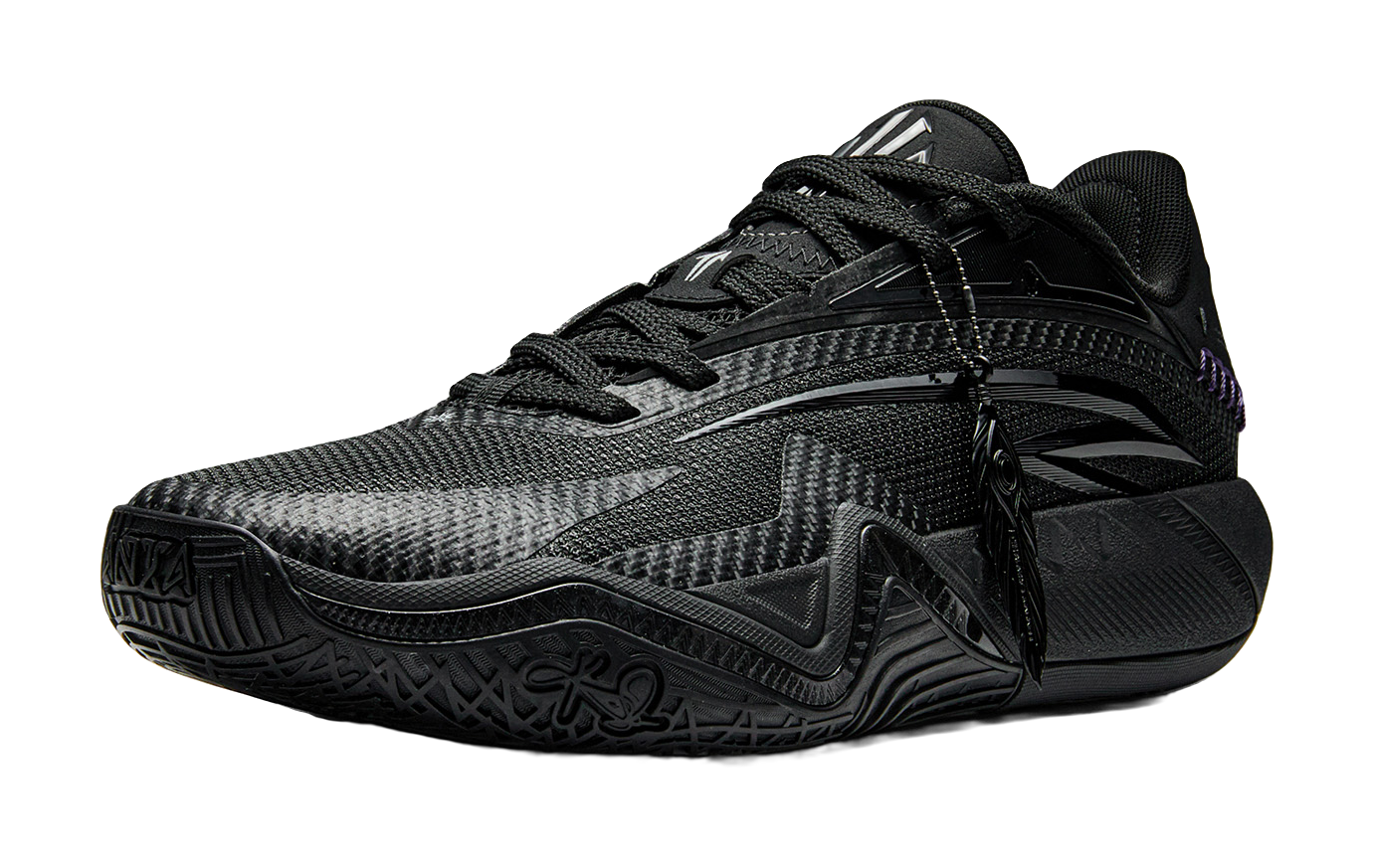 Black basketball shoe with textured mesh upper, lace-up closure, purple side accent