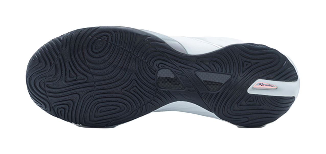 Black rubber outsole of a basketball shoe with multidirectional traction pattern