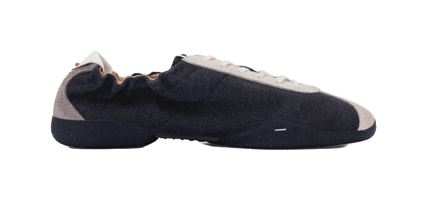 PANE low-top training shoes with dark upper and white trim, side view lace-up