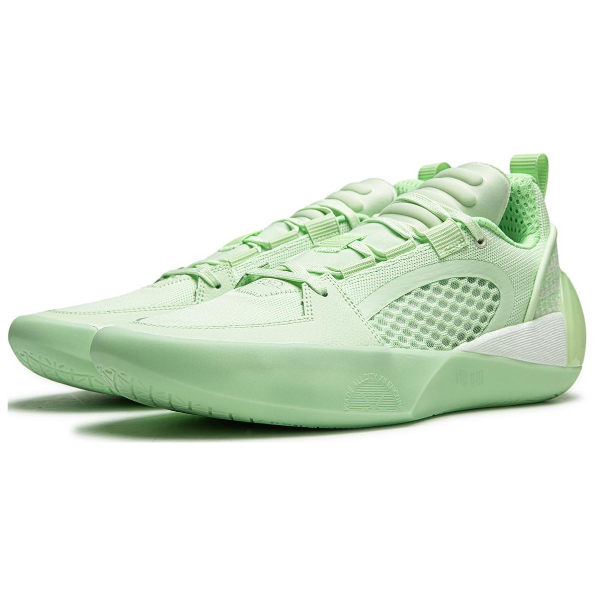 Agile green basketball shoe angled front view with mesh upper, lace-up design, cushioned sole.