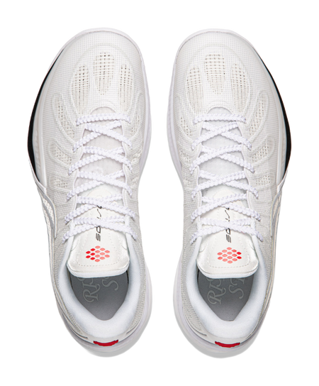 Pair of white lace-up basketball shoes with mesh texture and padded collars.