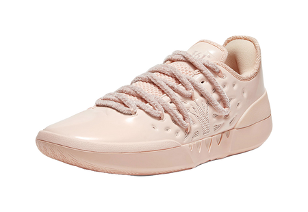 Soft pink low basketball shoe, lace-up with perforated details and stitched trim