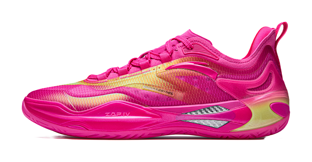 Pink basketball shoe with neon yellow accents and textured rubber sole