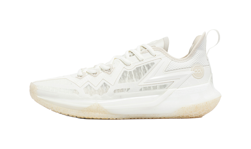 White and beige basketball shoe with lace-up closure and textured mesh upper