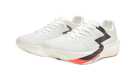 Pair of unisex low running shoes in white with black logo and orange outsole stripe