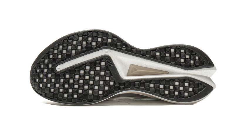 Running shoe outsole with black tread pattern and gray support panel, underside view.