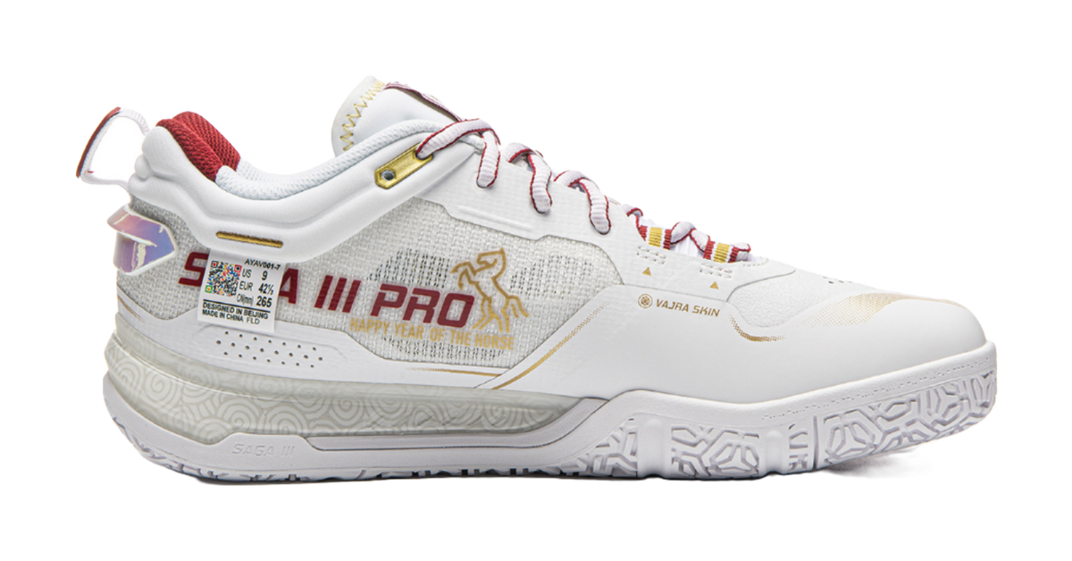 White and red badminton shoe side view with cushioned sole and ankle collar