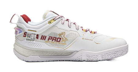 White and red badminton shoe side view with cushioned sole and ankle collar