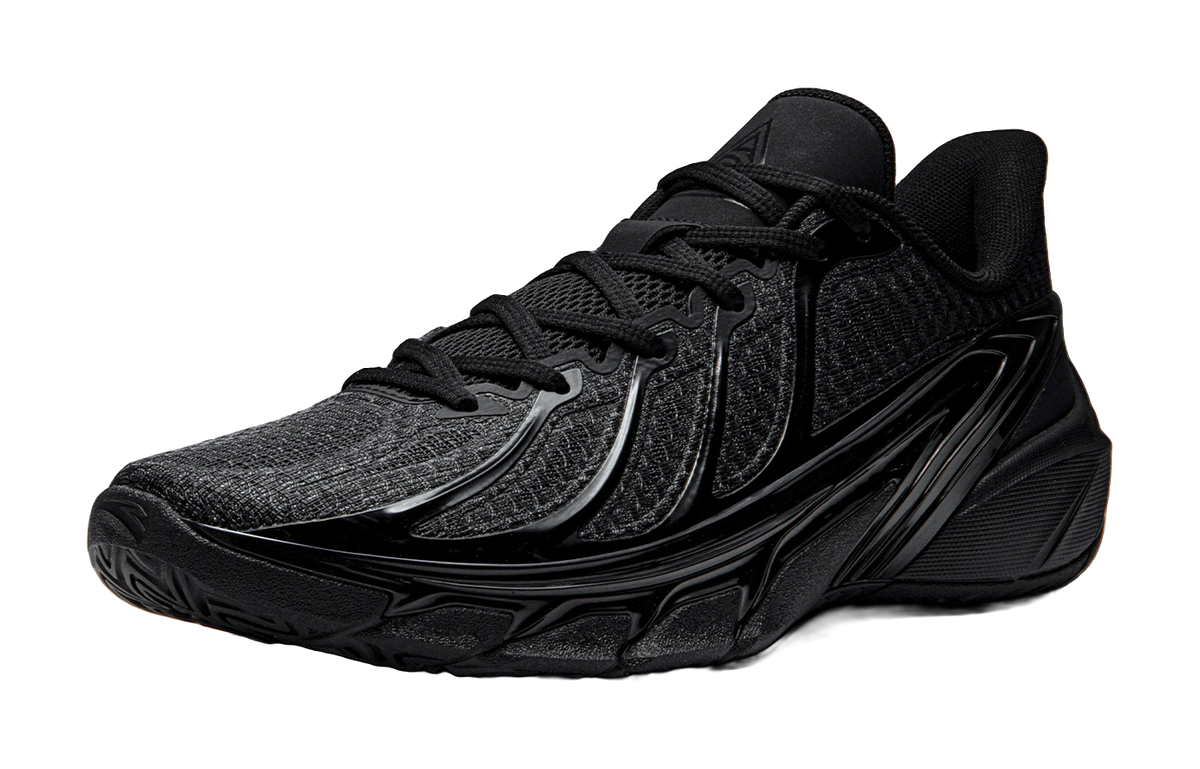 Black low-top basketball shoes with textured knit upper and lace-up front