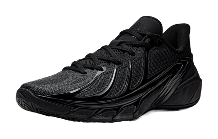 Black low-top basketball shoes with textured knit upper and lace-up front