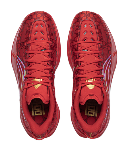 Pair of unisex red low basketball shoes, lace-up fronts with tongue padding