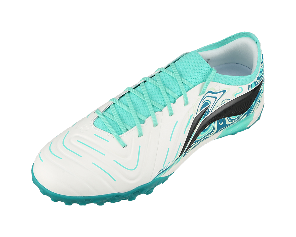 Unisex soccer cleat with teal laces, white panels, black side graphic, TF